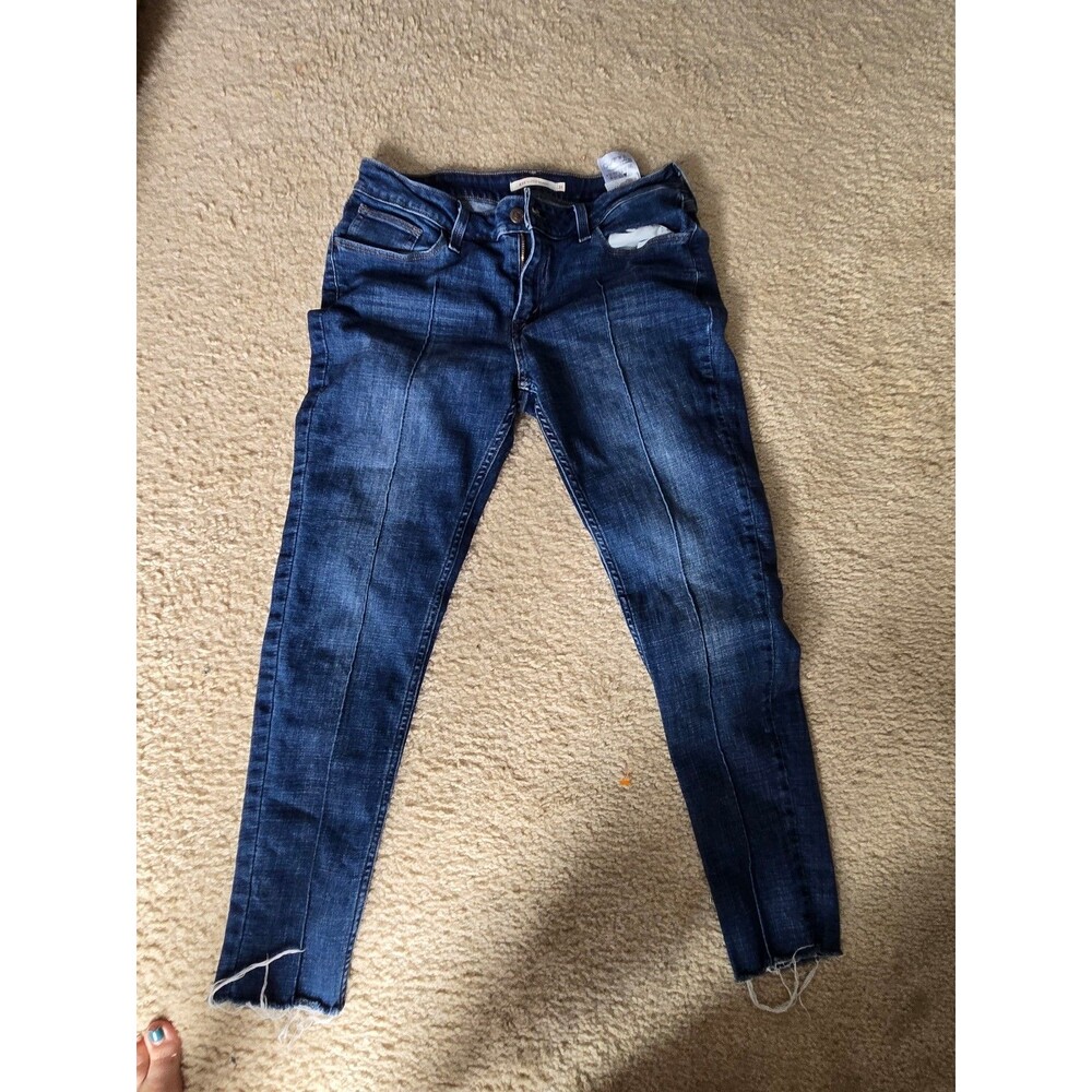 Levi's 535 Women's Skinny Jeans Distressed Hem Blue Denim. Size 31 x 26